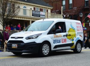 AWS Van leads the youth parade brigade in the May Day parade